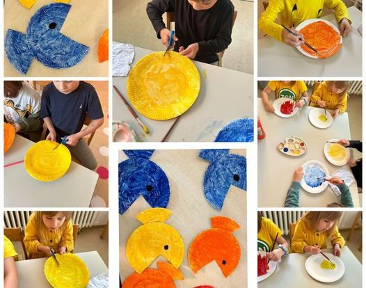 Ribice - Practicing fine motor skills and encouraging creativity by making fish out of paper plates.